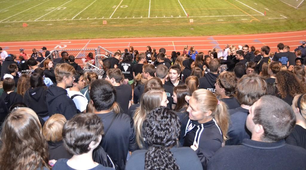 Carlisle Crazies cheer on the football team during a blackout.