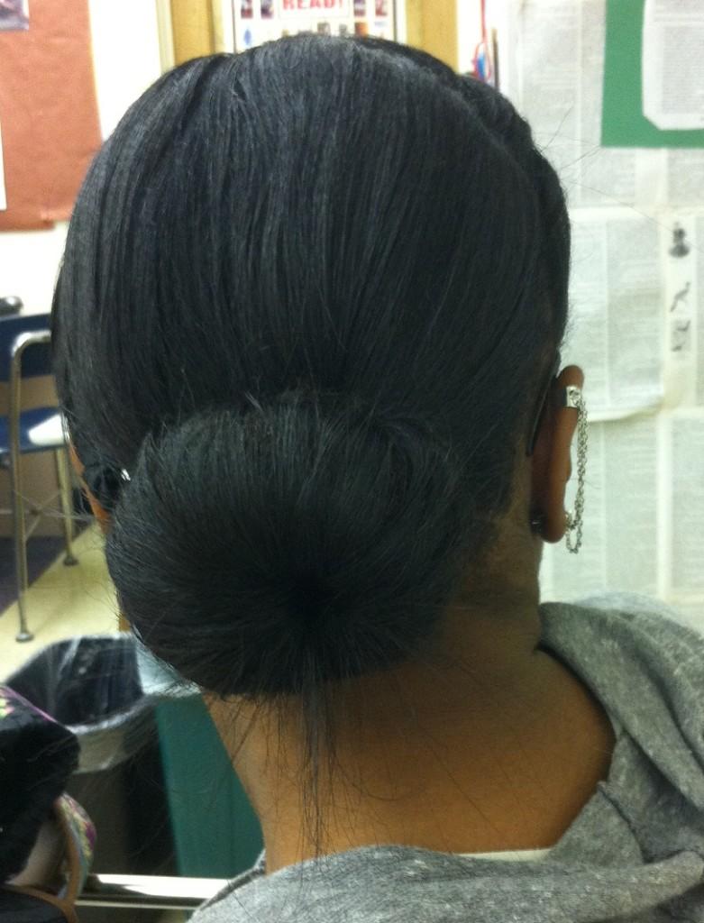 Kalia Stallings rocks a perfectly sleek sock bun.