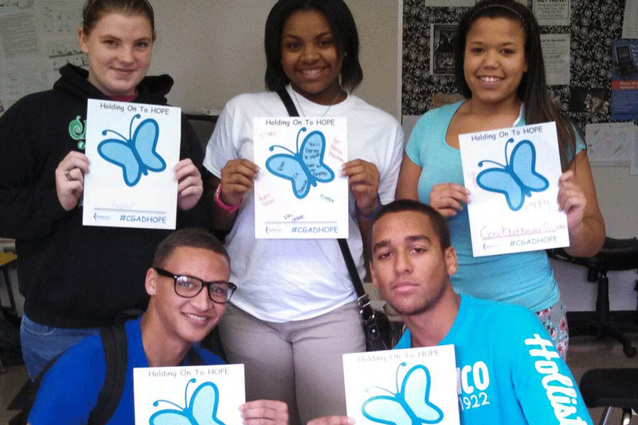 (From top left clockwise) Seniors Jenny Schaeffer, Jazmyn Campbell, Shanice Campbell, Sid Ewell, and Alex ODonely show their support for CGAD. 