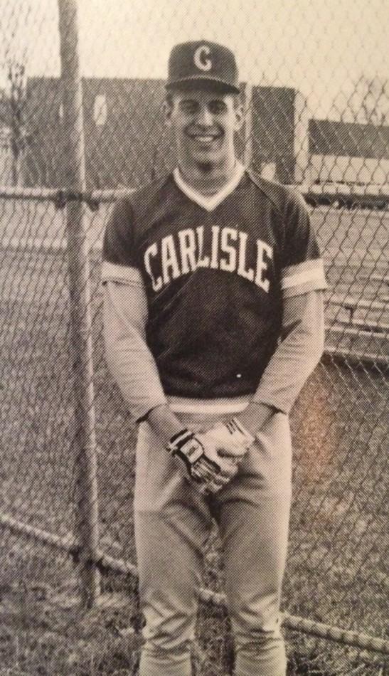 Doug Harris poses for a baseball picture during his senior year at Carlisle High School