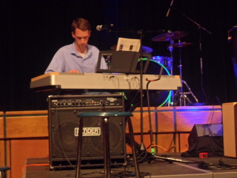 Senior Will Hume plays a movie song solo on the piano.