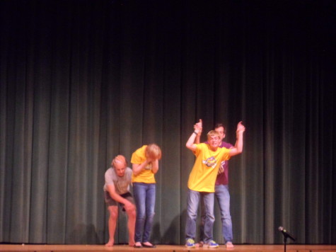 Math teacher Mr. Bigelow and CHS Alumni make freshman Derek Ray and Alexis VanMeter move around the stage; Alexis and Derek can only talk during one of the games. 