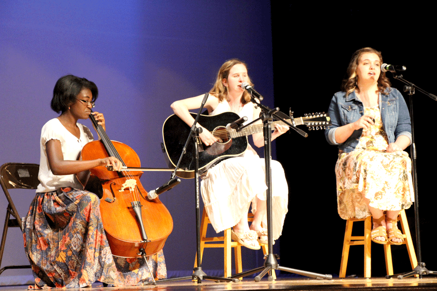 From the archives: 2014 graduates Amira Williams (left), Caitlin Dull, and Mallory Chaney perform Kiss Me by Sixpence None the Richer at the 2014 Renaissance show.  Seniors interested in trying out for this years show should sign up in the McGowan office as soon as possible.