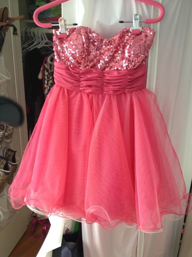 Short and sparkling, a dress like this will make you stand out at Homecoming. 