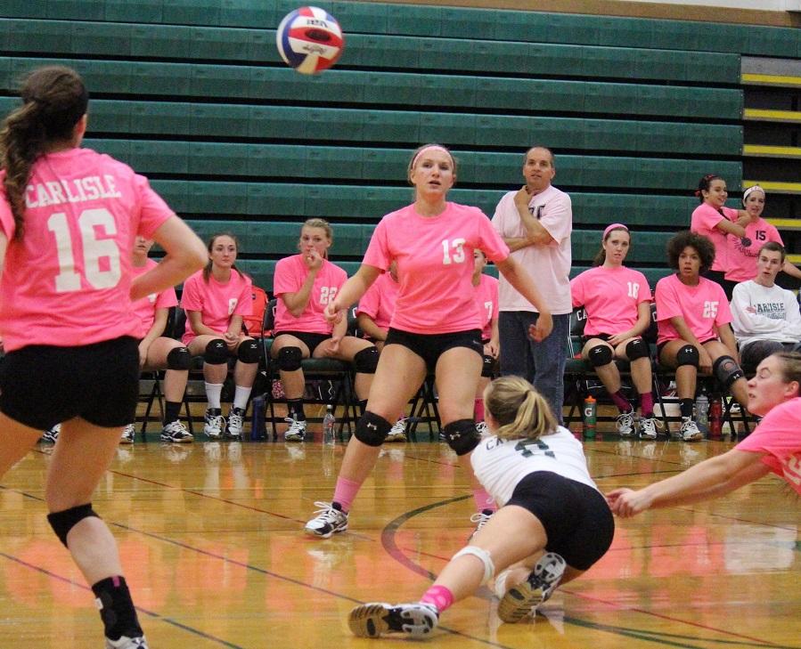 Despite an impressive run, the girls volleyball team (seen here on their Play for Pink night) has ended the 2014 season at the district level.