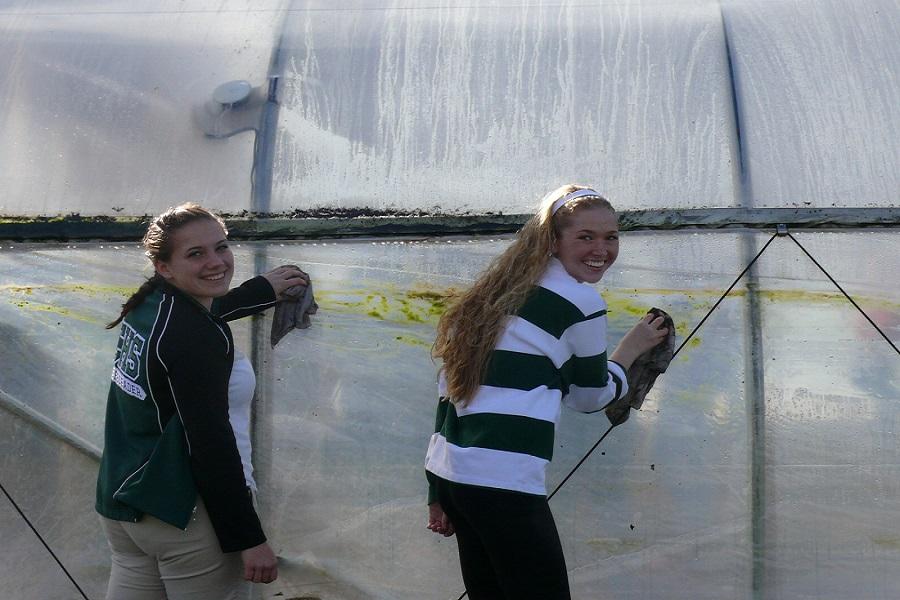 Members of the Project Share club recently spent their club period cleaning the greenhouse.