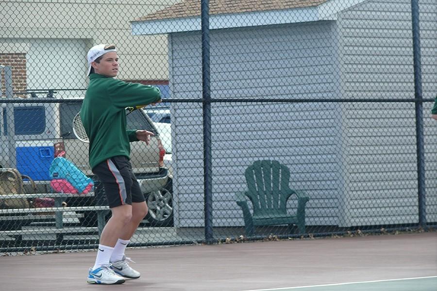 Sophomore Josh Denlinger practices his game.  The boys team lost several members from last year due to graduation.