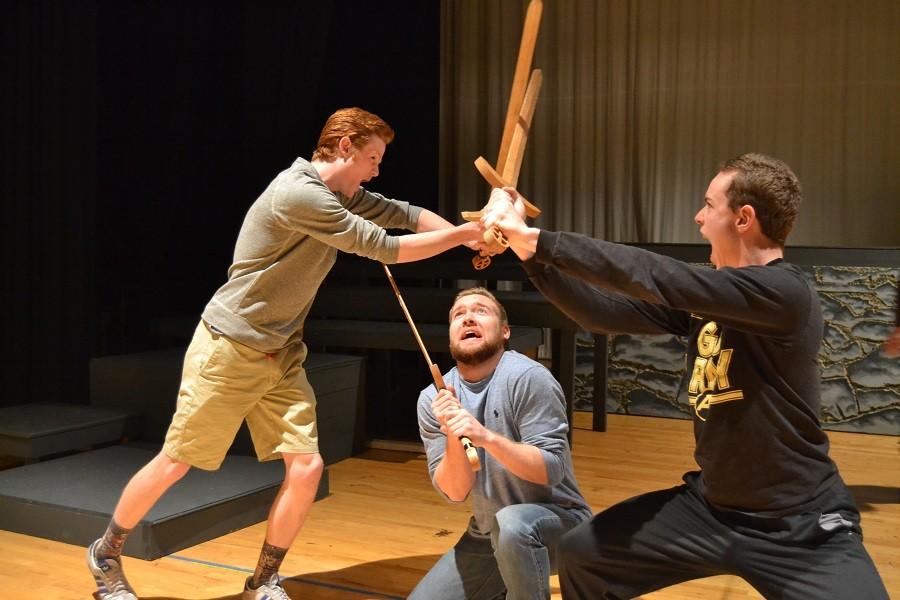 To get ready for the big day, the Shakespeare Troupe practices their sword fighting skills.  Performances start April 23.
