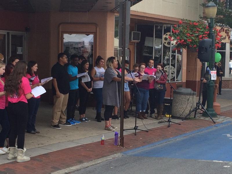 Members of the Carlisle Theater Company's cast of "Hairspray" perform downtown
