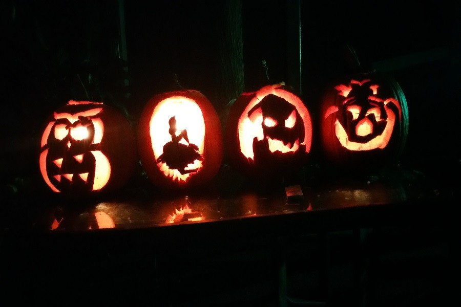 These+beautifully+carved+pumpkins+followed+designs+to+look+like+an+owl%2C+a+mermaid%2C+oogey+boogey%2C+and+the+Cheshire+cat.
