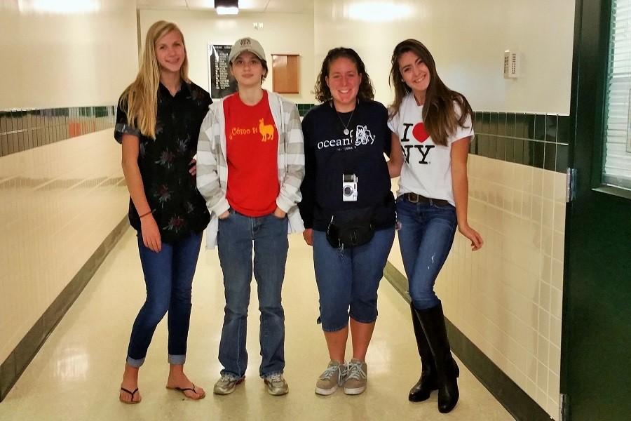 Students pose for the camera in their best Tacky Tourist outfits.