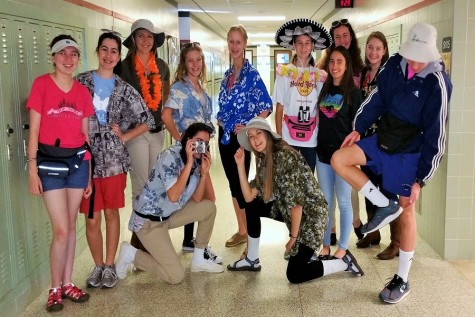 Students pose for the camera in their best Tacky Tourist outfits.