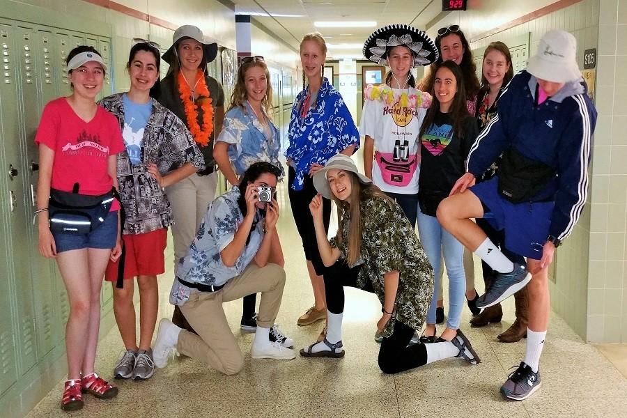 Students pose for the camera in their best Tacky Tourist outfits.