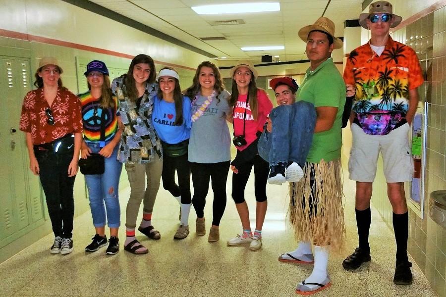 Students pose for the camera in their best Tacky Tourist outfits.