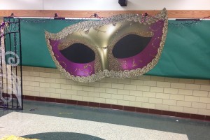 This year's decorations are all centered around the Mardi Gras theme.