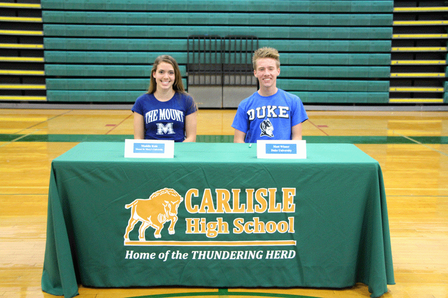 Seniors+Maddie+Kole+and+Matt+Wisner+signed+with+Mount+St.+Marys+and+Duke%2C+respectively%2C+today.++They+are+both+accomplished+track+and+cross+country+runners.