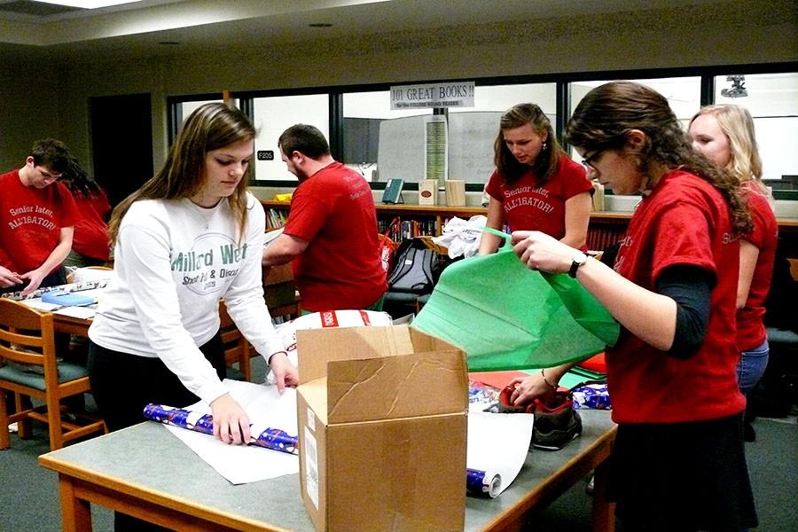 The Senior Class Council gives back by wrapping presents for those in need.