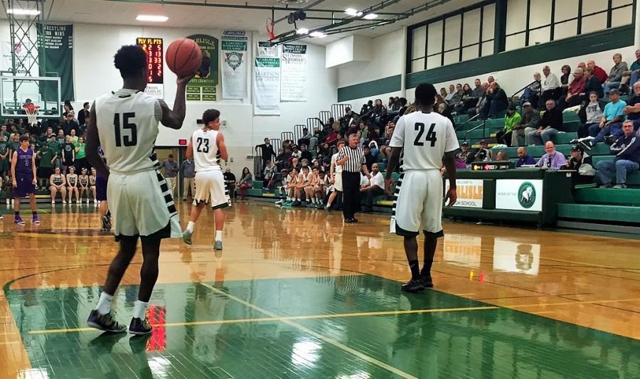 CHS boys basketball players (left to right) Deshawn Millington, Nate Barnes and Jordan Purcell held their own on the Carlisle court Dec 4 during the Carlisle Classic tournament.