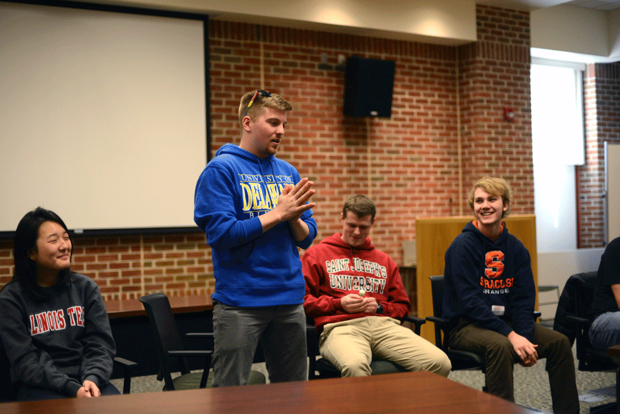 During an ACT seminar held on Thur 1/7, CHS alums often mentioned that college is about how much work one chooses to put into school.  Pictured (from left to right): Yunjin Yang, Kyle Wise, David Erfle, and Ryan Doody.