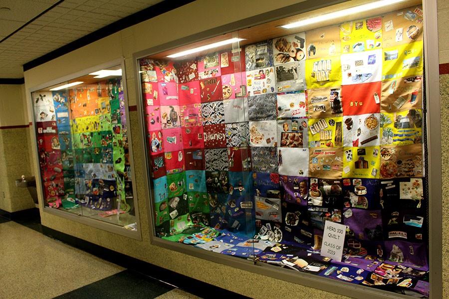 These class quilts are made up of patches designed by students who attended Herd 100.