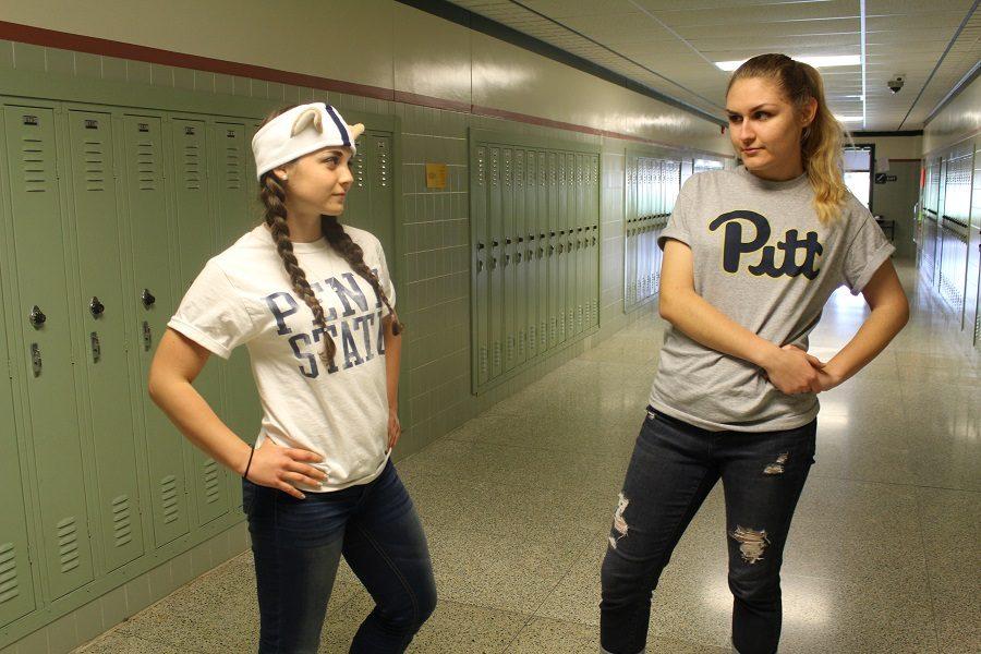 There is friendly rivalry going on between seniors Megan Godfrey (left) representing Penn State University and Amina Alagic (right) representing  the University of Pittsburgh. 