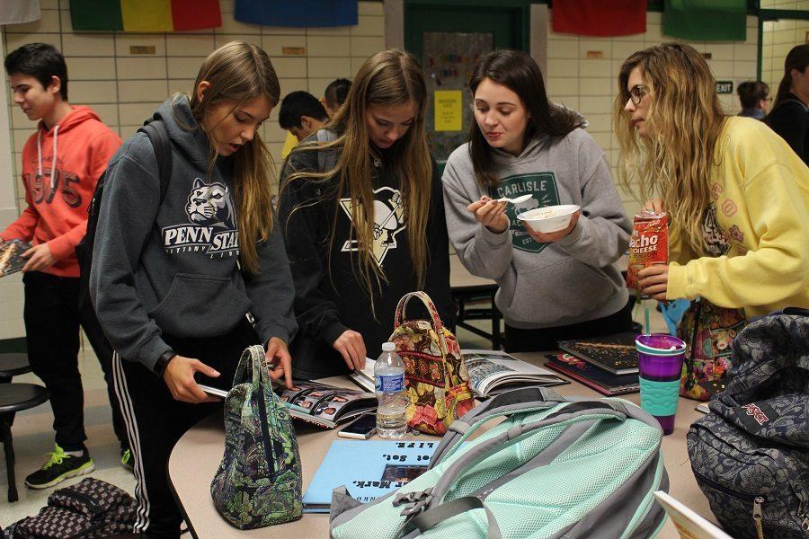 Seniors Alayna Panko, Lily Schwartz, Maggie Brehm, and McKenzie Mangan attended the Distribution party, where they got ice cream, gel pens, and a chance to get their yearbook early.