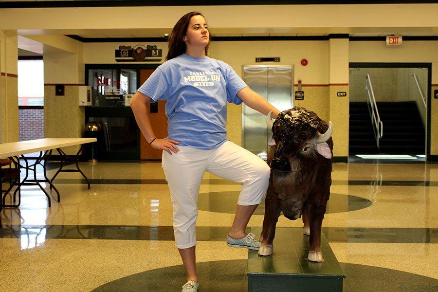 Rowan, Editor-in-Chief, poses with the bison.