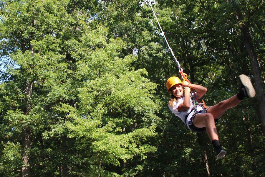 New student from Oklahoma enjoys her experience on the Giant Swing.