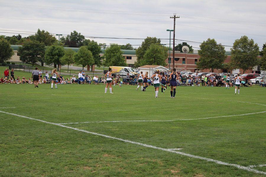 The varsity field hockey team plays against Cedar Cliff as the middle school field hockey team observes. 