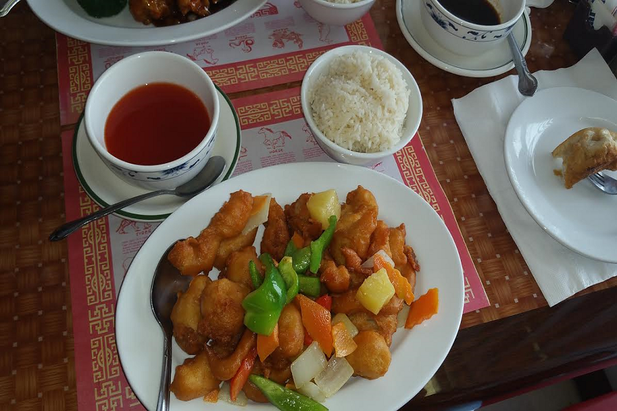 The sweet and sour chicken was served up with vegetables, a mouth watering sauce, and white rice. 