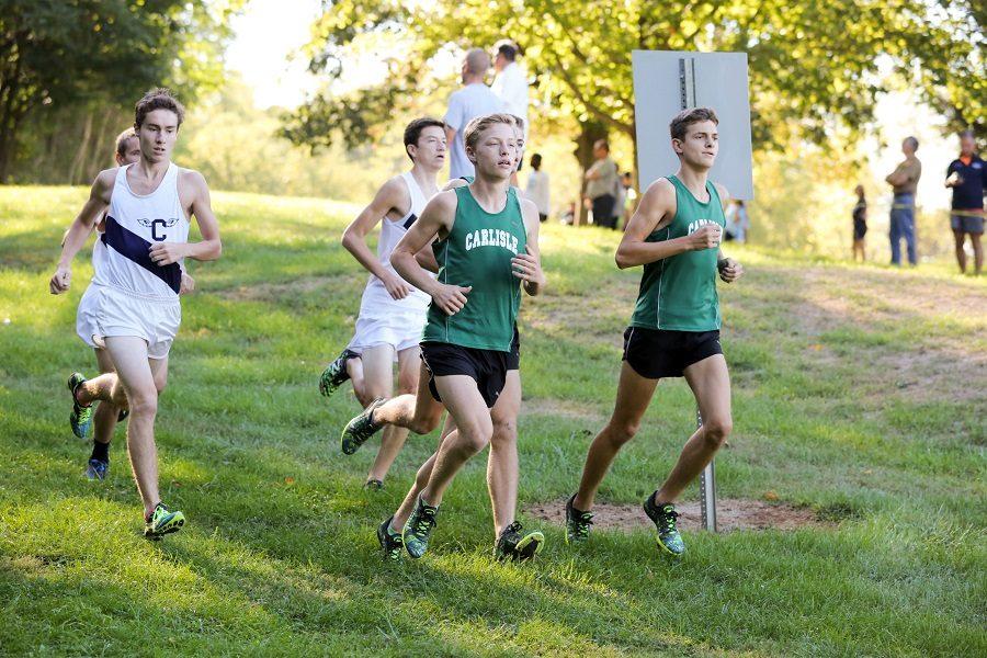 Seniors Noah Affolder and Issac Kole ran ahead of Cedar Cliff runners during a cross country meet.