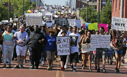  In this Sunday, July 10, 2016 file photo, people march in a Black Lives Matter rally in Oklahoma City. Black Lives Matter has quietly established a legal partnership with a California charity in a sign of the movement's growth and expanding ambition. The Associated Press has learned that IDEX is managing the group???s financial affairs, allowing Black Lives Matter to focus on its mission, including building local chapters and experimenting with its organizational structure. (AP Photo/Sue Ogrocki, File)