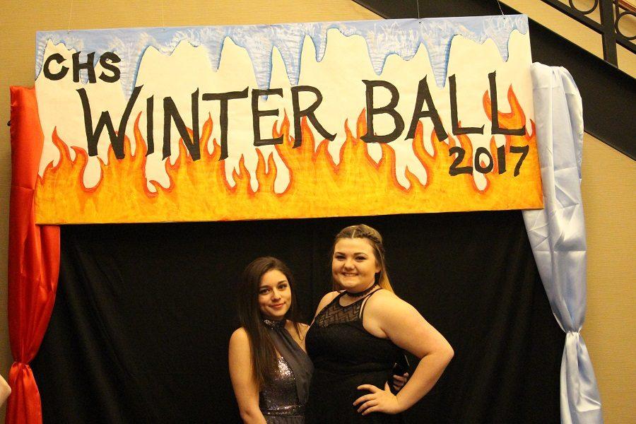 Destinee Foust and Marrissa Stephens pose for a picture before entering the dance floor at Winterball.