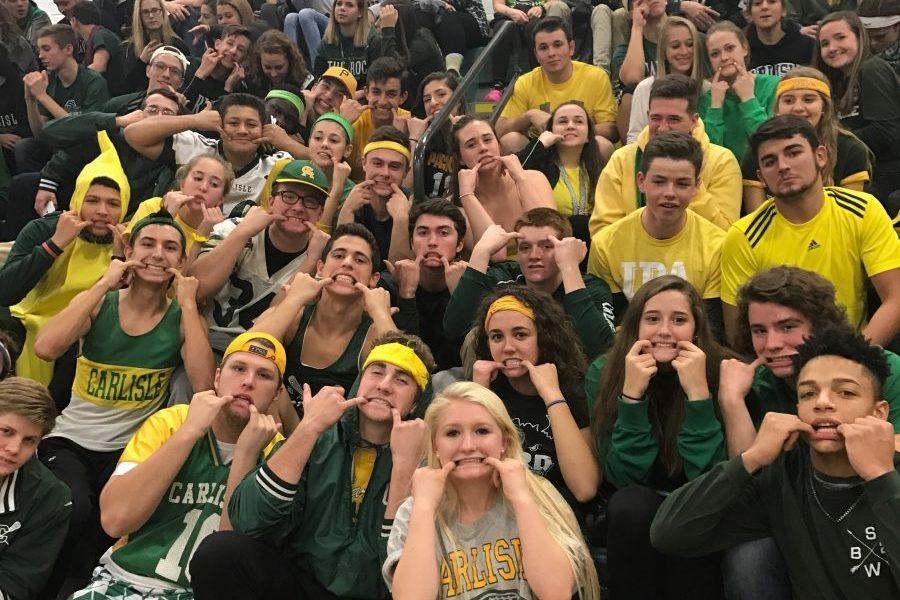 The+Carlisle+Crazies+taunt+the+---+during+the+boys+basketball+game+against+South+Western+during+the+Carlisle+Classic+tournament.