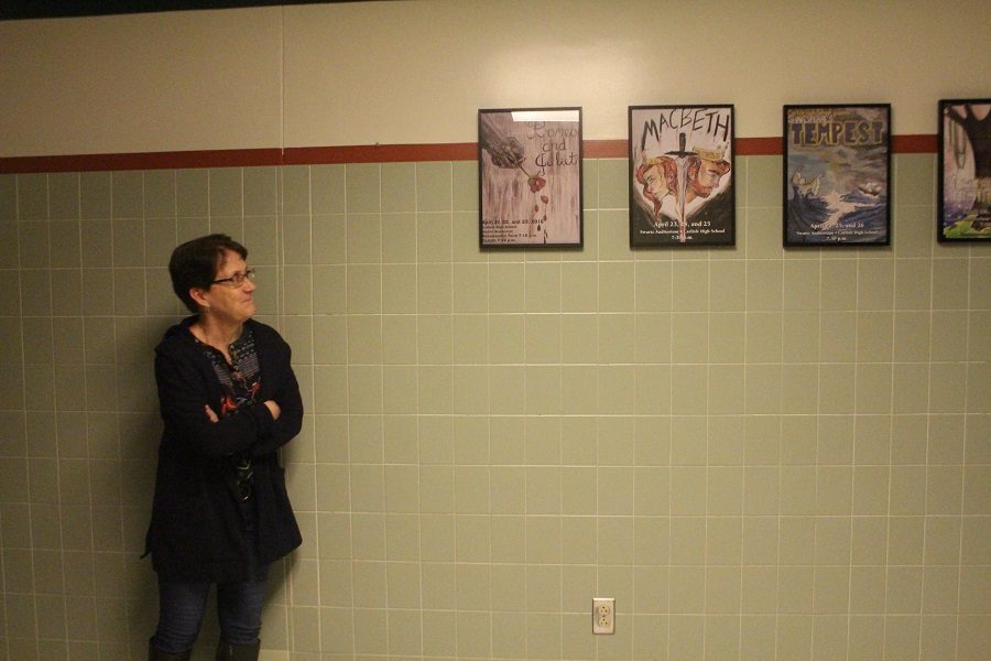 Hench looks at the legacy that she has created with the Shakespeare Troupe via a display of Shakespeare Troupes ad posters.