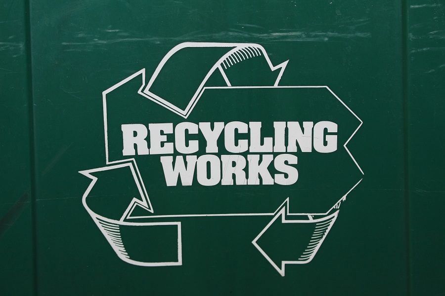 A green container in the school is used for recycling.  The members of the CHS community need to learn the materials that can and cannot go into these bins to make recycling effective at CHS.