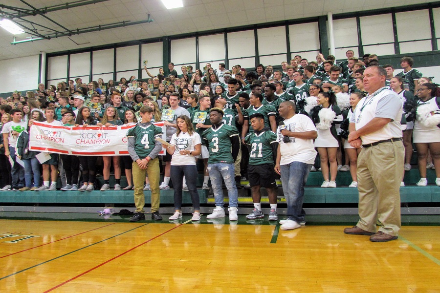 Three members of the football team, Caleb Richwine, Gavyn Barnes, and Rojen Porcopio, were interviewed. The football players showed support as they filled in behind to cheer them on.