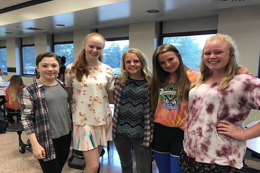 Sophomores Madeline Thorndike, Kensington MacMillen, Sophia Toti, Emily Evers, and Audrey Barefield show off their wild outfits. Many students planned matching outfits with their friends.
