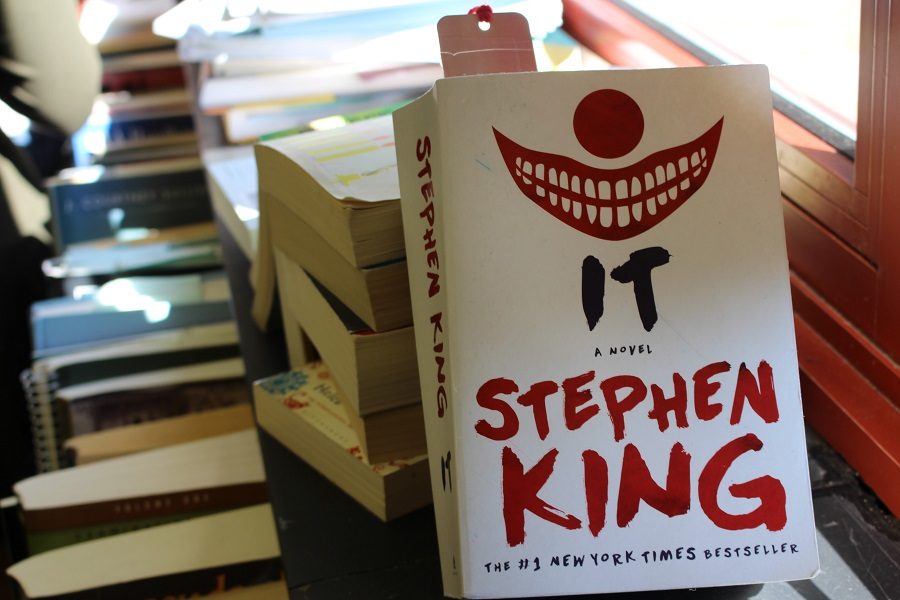 It by Steven King is a horror novel about a dark entity terrorizing the town of Derry. This book was recently adapted into a successful movie.