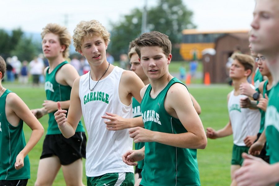 Sophomore Casey Padgett and junior Caleb Kennedy compete in a meet earlier in the season.  The team will move onto districts this weekend.