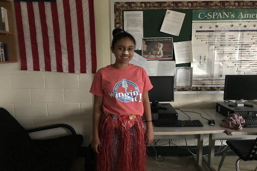 Freshman Trinity Johnson wore a grass skirt for tropical day. 