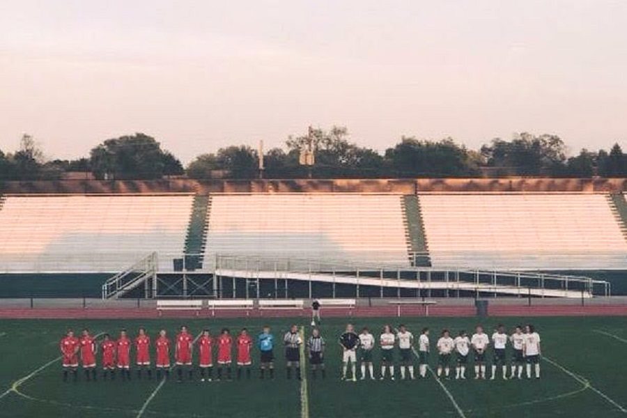 This is the boys soccer team getting introduced before their game against CV.  This is an important part of the pregame preparations.