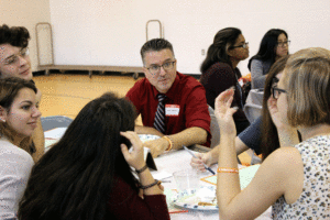 CHS social studies teacher Mike Gavazzi talks to students from other schools about issues regarding racism in schools. Students from local schools including Carlisle,, Boiling Springs, Shippensburg, and Harrisburg shared their experiences in round table discussions.