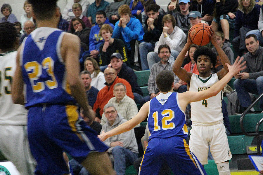 Senior Eveyon Davis lines up a shot for the Herd. Carlisle beat Waynesboro, 61-59, on Fri Feb 9.