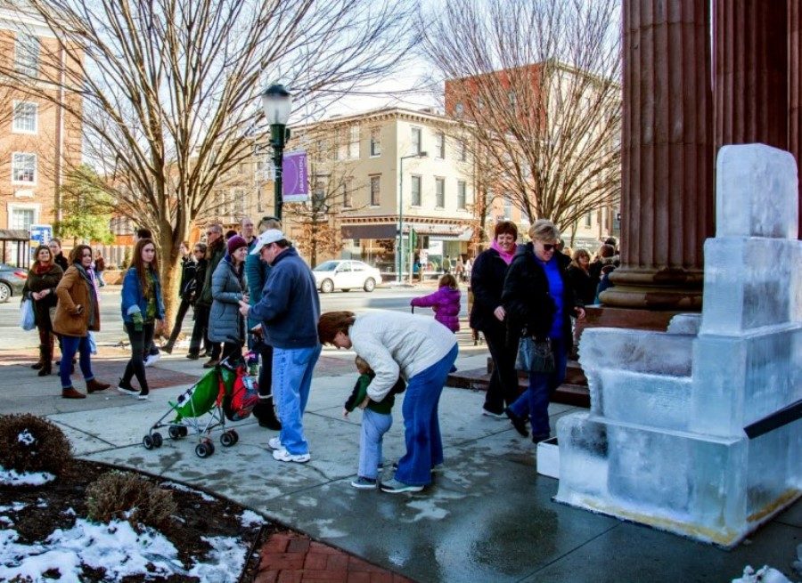 Ice Art Fest attendees try out the CenturyLink ice throne in 2017. CenturyLink is sponsoring the Ice Art Fest again for 2018. 