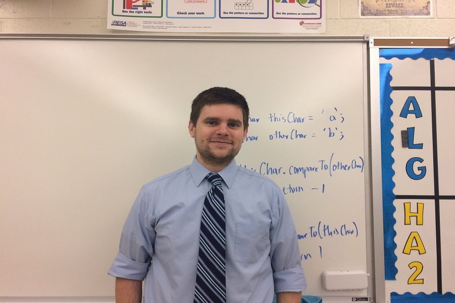 Jeffrey+McMahon+stands+in+his+classroom+in+Swartz.+He+is+the+first+teacher+at+CHS+to+teach+AP+Computer+Science.