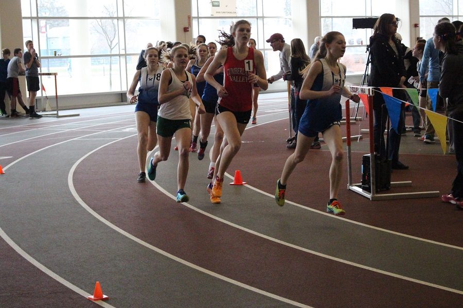 Sophia Toti powers around the track to help claim the 7th place title in State College. This is Toti’s first year
on the team.