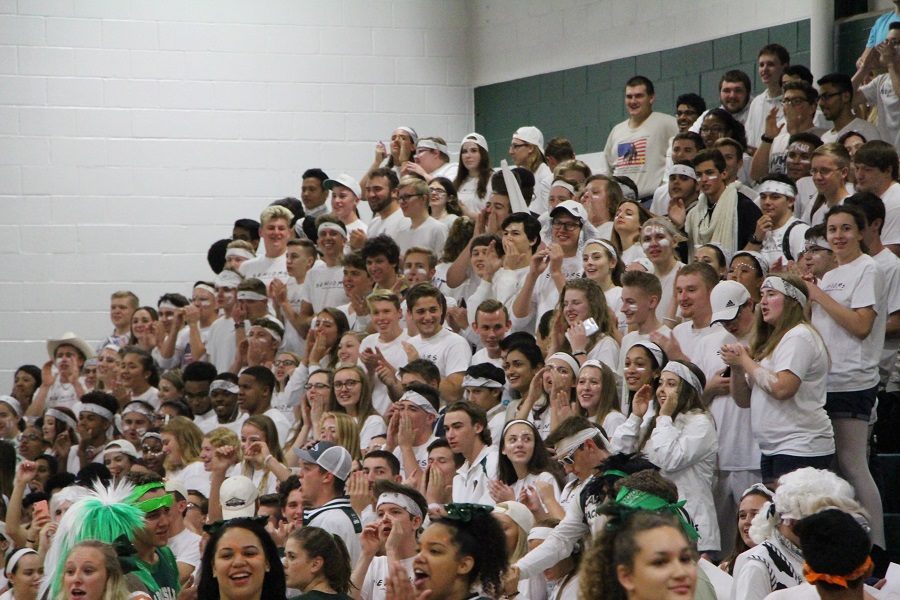 The senior class proudly wears their class color, white, at the Homecoming Pep Rally last year.