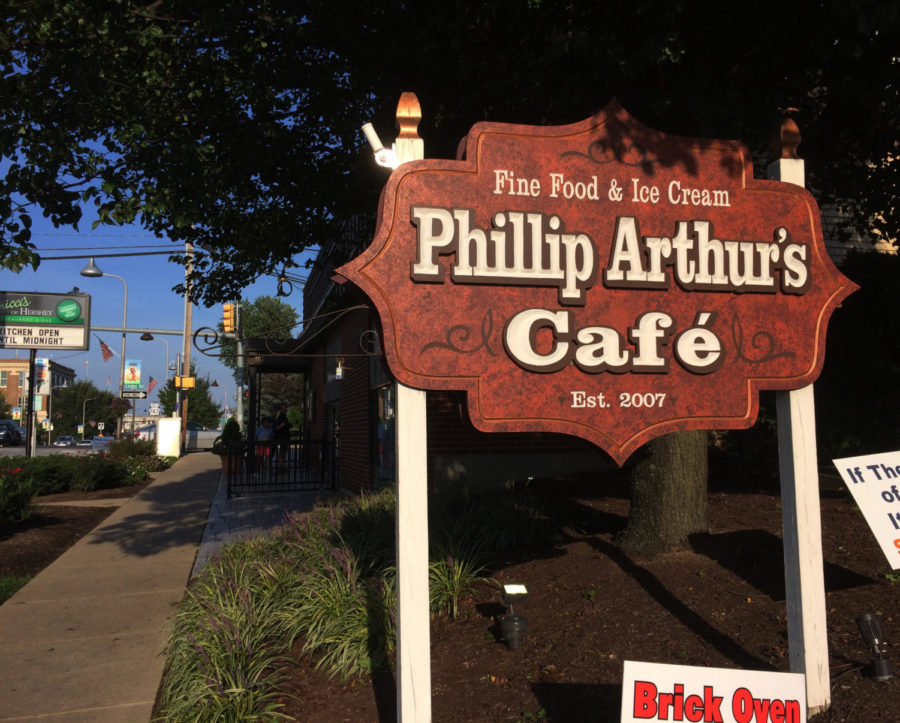 The sign of Philip Arthurs cafe.