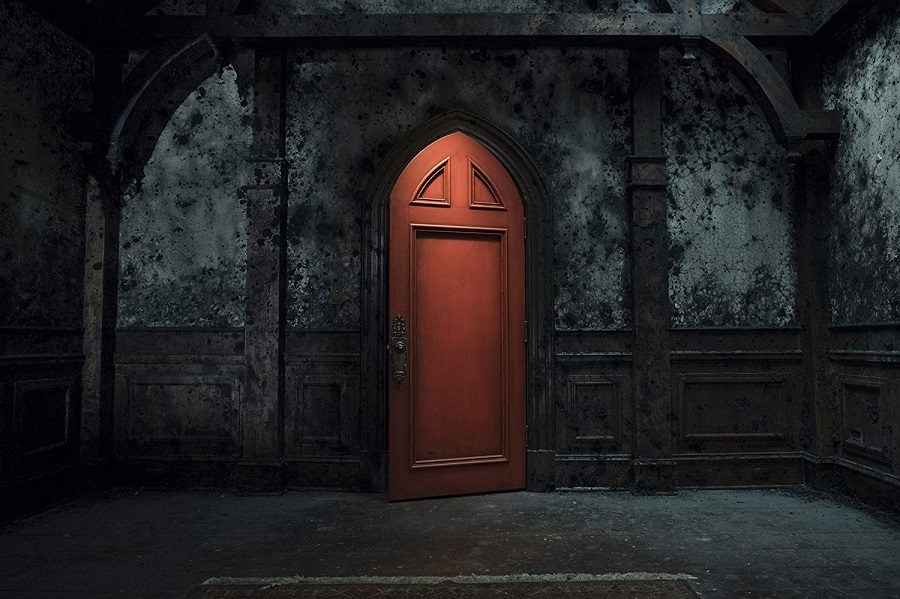 The wooden door, with the dark colored walls adds to the horror factor of the show.  The Haunting of Hill House began streaming on Netflix Oct 6.  